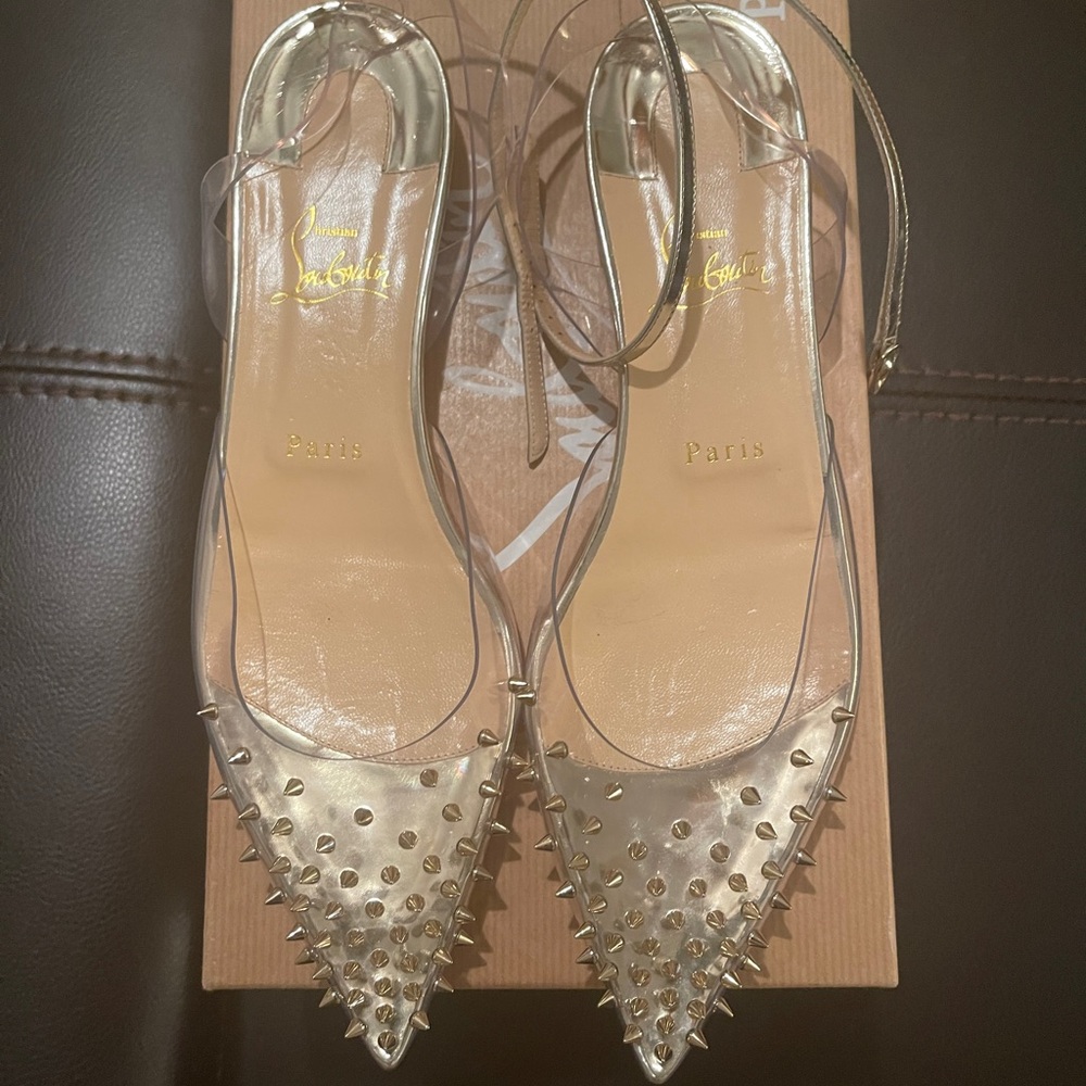 Christian Louboutin Spikoo Flats. Never worn.